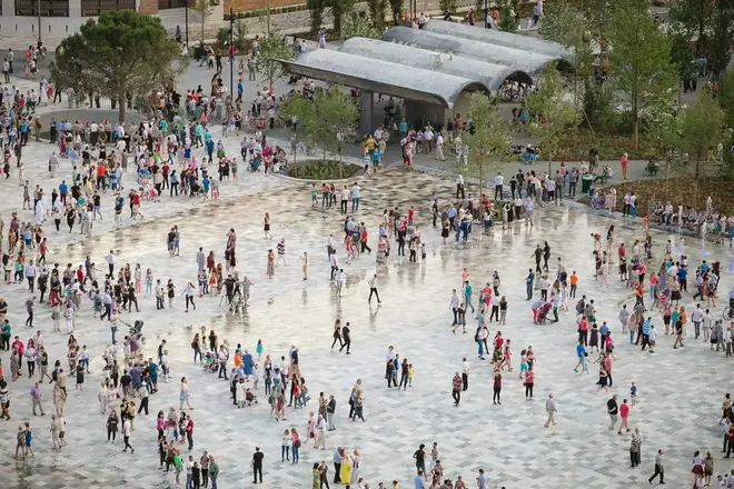 Travelers joining a free walking tour in Tirana